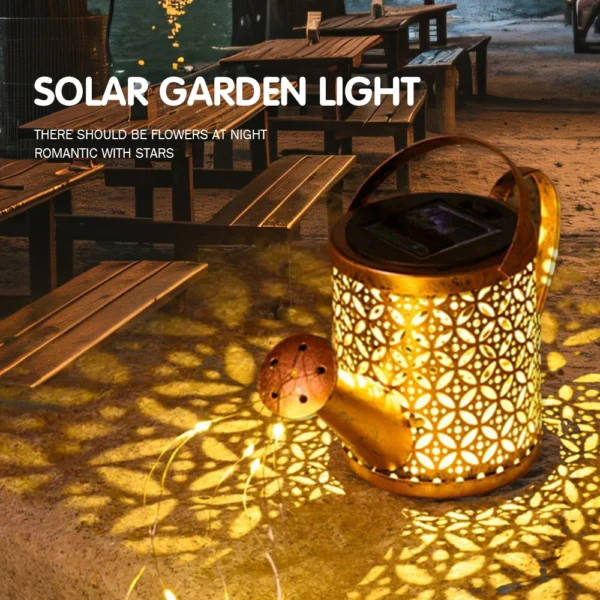 Add a touch of whimsy and elegance to your outdoor space with the Casaroja Solar Hanging Watering Can Light